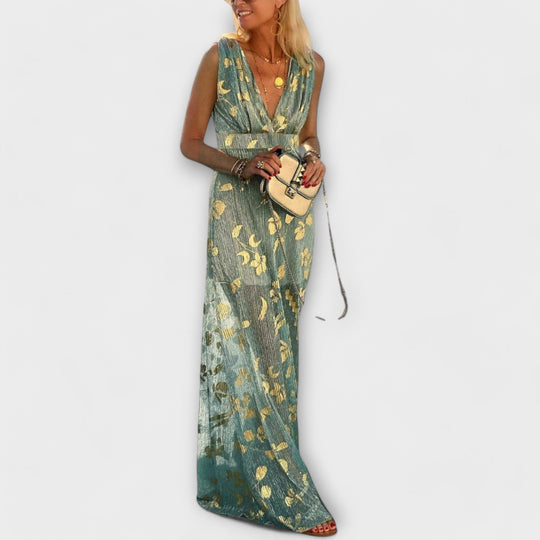 Kleit V-kujulise kaelusega ja läikivate detailidega