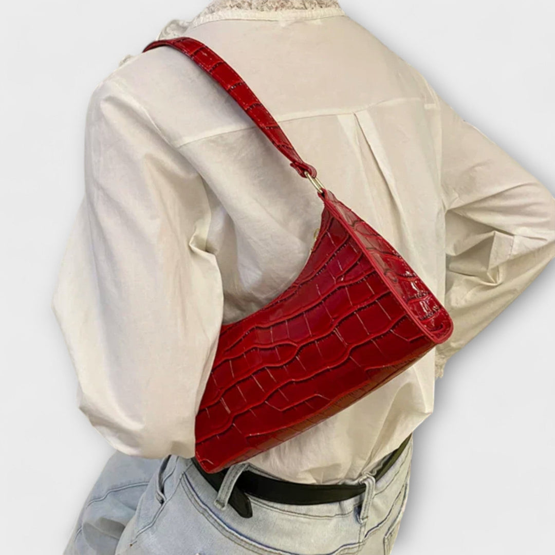 Lora. - Läikiv nahk käekott