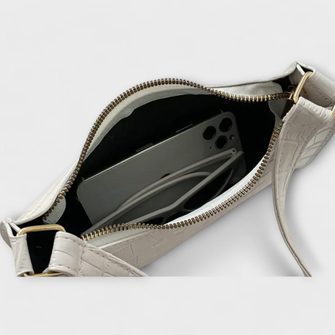 Lora. - Läikiv nahk käekott