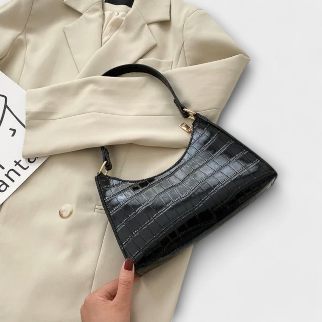 Lora. - Läikiv nahk käekott