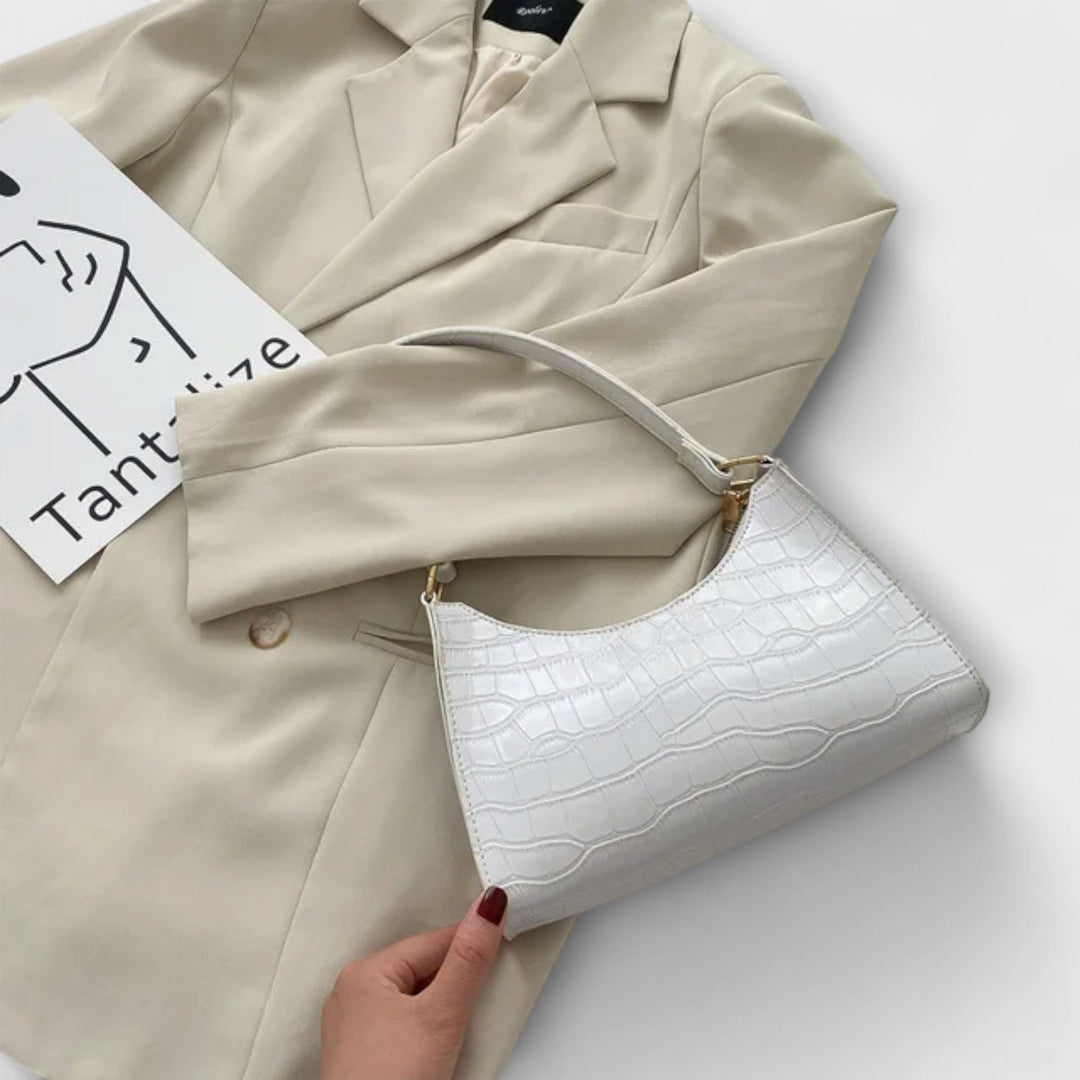 Lora. - Läikiv nahk käekott